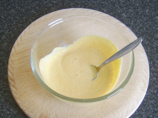 Combining turmeric and garlic dip ingredients