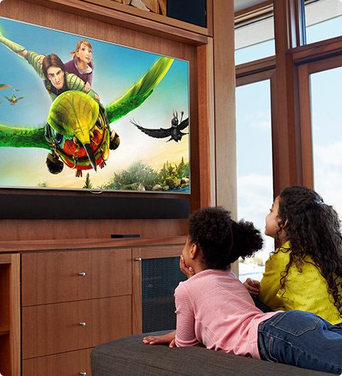 A few kids watching an animated movie with the Kindle Fire TV