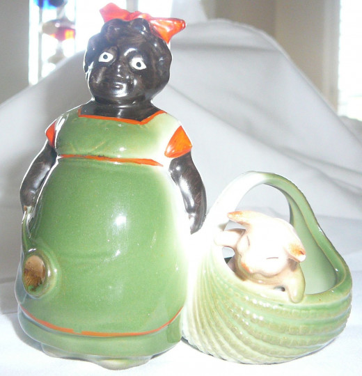 This cook carries a large spoon and a little piggy in her basket. I've only seen 5 of these on ebay in 4 years. The price ranged from $501-$1,025. Featured in "This little Piggy" the '92 price was $340. 3 1/2" x 5". 