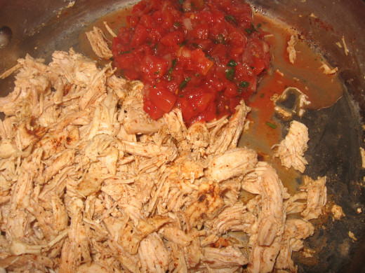 1. Mix salsa with the seasoned shredded chicken (cumin and chili powder).  Instead of using store-bought salsa, this is where you add the homemade one from our 5-Minute Salsa Recipe above! 
