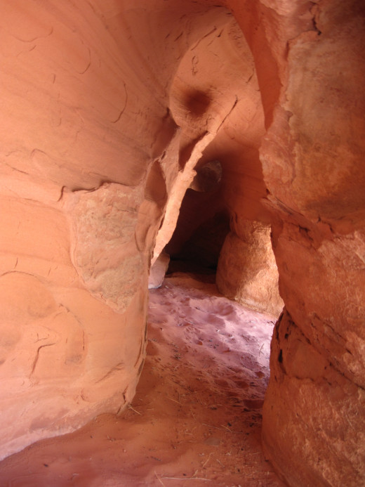 Here's a beautiful cave lined with soft red sand; I was tempted to lie down in it for a siesta. 