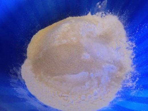 Add all of the dry ingredients (cornmeal, flour, sugar, baking powder, salt) into a bowl.