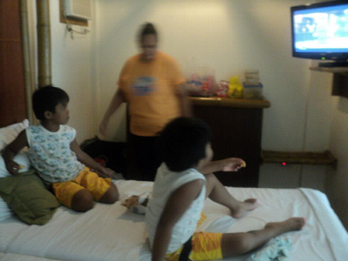 Kids watching TV inside Casa Montana