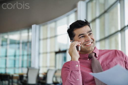 Pretending to call important clients to impress the other employees.