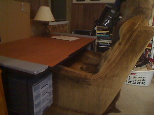 The completed, assembled Alvin Craftmaster II drafting table with my new chair pulled up under it -- it fits! This will work! I love it!