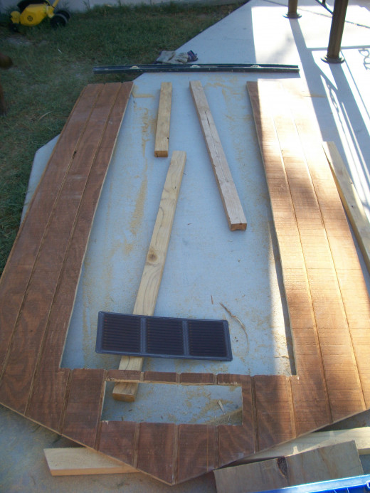 A rectangle was carefully measured, marked, and cut out for the front attic vent.