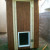 After front siding is installed and door assembly is complete, vertical trim was installed for mounting the hinges. After front siding is installed and door assembly is complete, vertical trim was installed for mounting the hinges.