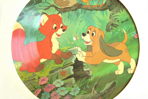 A picture of a record album with the Soundtrack for the Fox and the Hound animated movie.