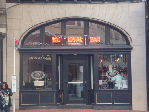 Front of the Legal Sea Foods Bar, on 7th Street NE, and G Street.