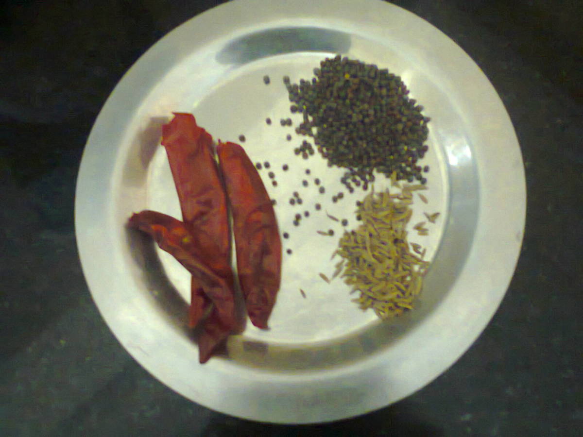 Red chillies, mustard seeds, cummins for frying along with vegetable skin peels or leaves