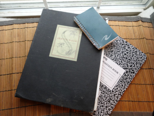 These are the sketchbook and notebooks that go everywhere with me.