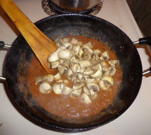 Boiled mushroom are added in the pan