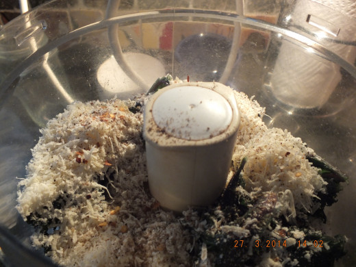 All the ingredients go in except for the olive oil.