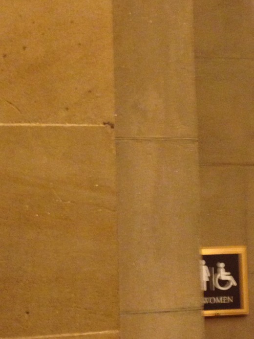 THE WALL NEXT TO SENATOR CALHOUN'S STATURE SHOWING THE MARK OF ANOTHER BULLET.