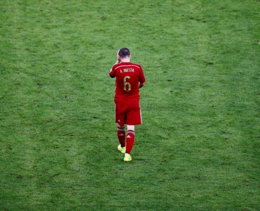 Disappointed Andre Iniesta after the first round elimination of Spain from FIFA world Cup 2014