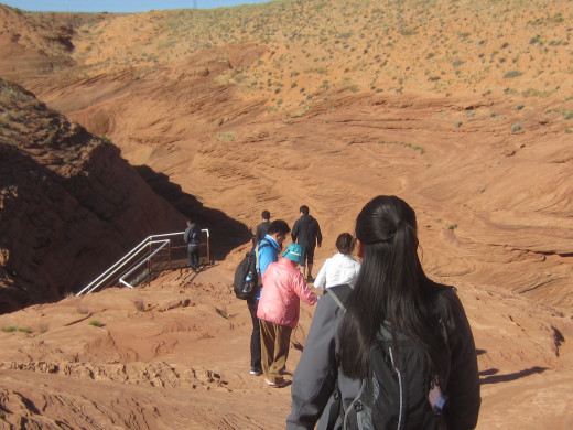 Some of our group in wash getting ready to climb down into Lower Antelope Canyon
