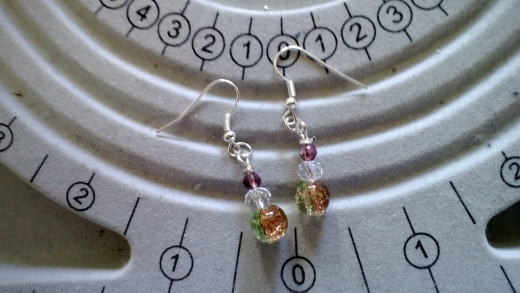A pair of hand-made earrings