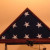 FLAG GIVEN TO ME AT MY RETIREMENT FROM AIR FORCE CIVIL SERVICE; IT WAS FLOWN OVER THE CAPITOL BUILDING AND THEN OVER THE PENTAGON PRIOR BEING PUT IN THE DISPLAY CASE.