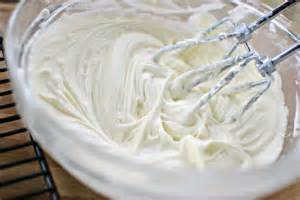 preparing cream cheese, cool whip and sugar