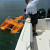 Tethering the paddle boat to the marine boat
