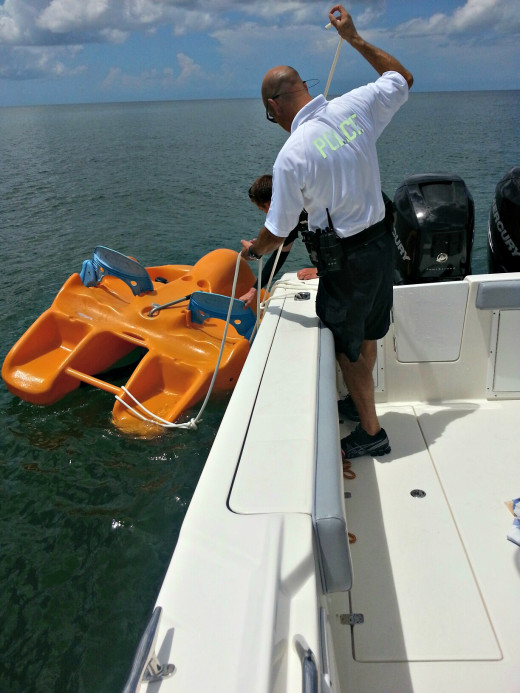 Tethering the paddle boat to the marine boat