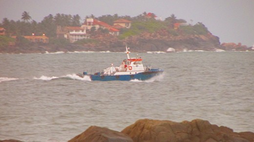 Boat leaving the harbour (shot from the Galle ramparts).