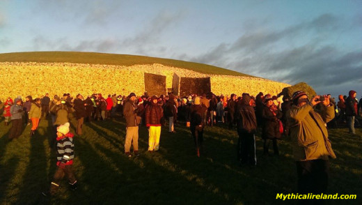 People gather to see the rising of the sun on the Winter Solstice. 