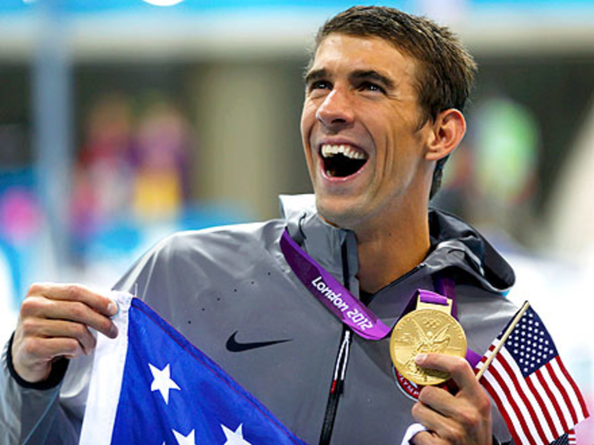 Michael Phelps wins gold.