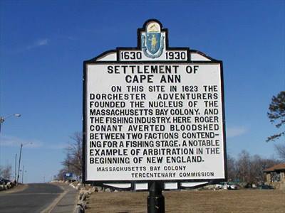 A historical marker, signifying the roots of the settlers in New England