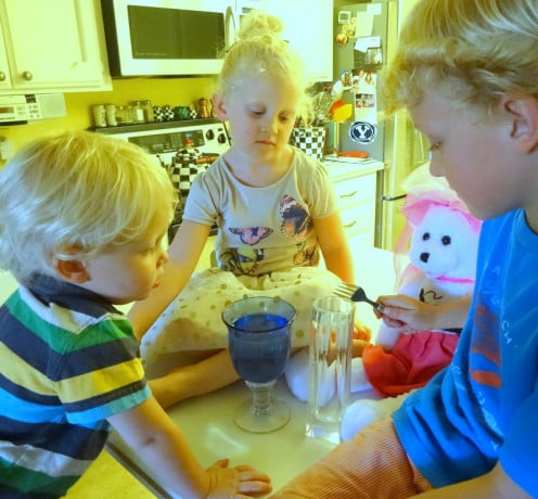 Children accompany "Kersploshes" with tuned water glasses.