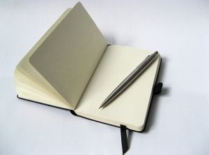 A notebook and pencil that every writer needs