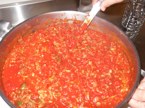 Pot of tomato sauce cooking.   
