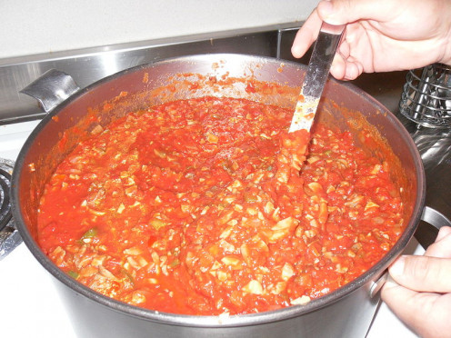 Another picture of pot of tomatoes cooking for sauce.