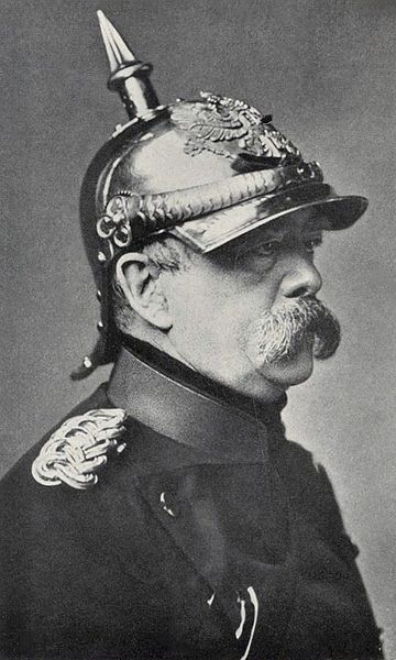 The Prussian spiked helmet, or Pickelhaube was designed in 1842 by King Frederich Wilhelm IV of Prussia. It was made of boiled leather with a metal trim. Incidentally the man under the helmet is Otto von Bismarck.