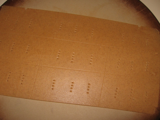 7. Use a knife to cut your desired shape into the dough.  Then prick the dough with a fork.  