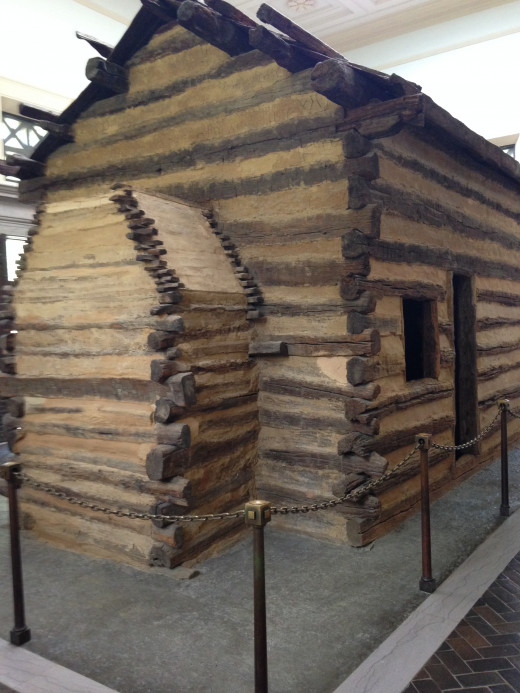 RECREATION OF LINCOLN'S CABIN WHEN HE WAS A BABY, LOCATED IN LINCOLN MEMORIAL - SIDE VIEW