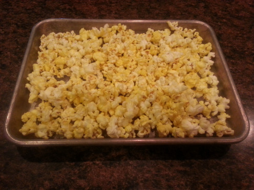 * Don't pour your popcorn out onto the cookie sheet, remember, we don't want the uncooked kernels!  Throw away uncooked kernels.