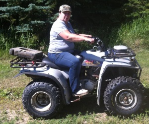 The quad is a valuable asset on the wooded acreage.