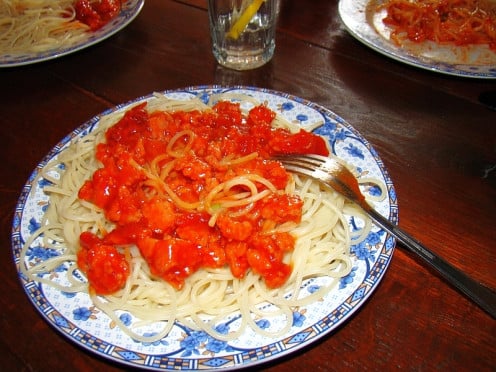  Cooked Spaghetti Pasta and Homemade Sauce served on a plate. Ready to be served to family and friends.