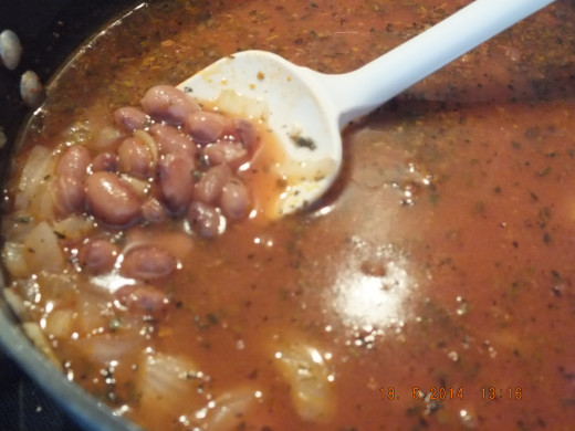 Add your beans and cooked noodles. Simmer for about 10 minutes.