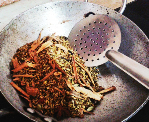 once it is roasted to the maximum, add cinnamon sticks, start anise, green cardamom, cloves and poppy seeds. Roast these and off the flame, allow the same to cool down.