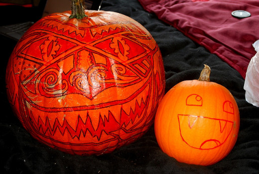 Prepare your pumpkin for carving by transferring your design onto the pumpkin's surface.