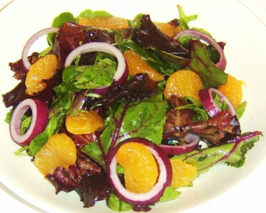 Mandarin Orange and Red Onion Salad with Champagne is one of the appetizer recipes featured in The Lucky Santangelo Cookbook