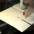 Open and add glue and long-handle paintbrush.