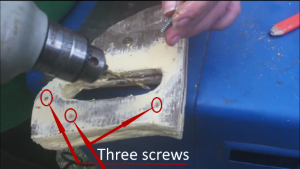 Three screws will be inserted to squeeze the two handle sections together.