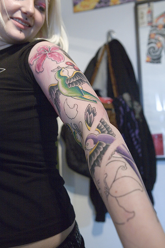 Here is another great sleeve tattoo for girls. Credits: http://farm4.static.flickr.com/3449/3351985416_fd79f9004a.jpg?v=0