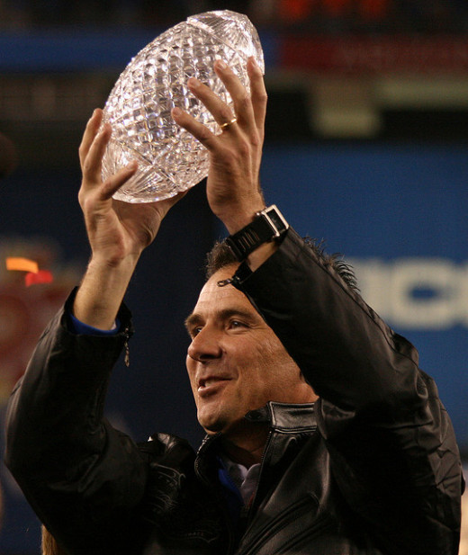 Urban Meyer Hoists the BCS Title Trophy.  