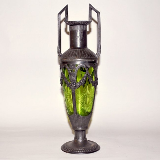 British pewter and green glass vase