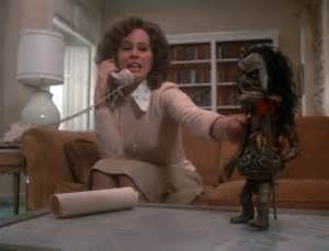 Karen Black as "Amelia" and the Zuni doll spend a quiet Friday night alone
