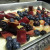 Pour the fruit on top of the dough, then press it down slightly with the back of a spoon.